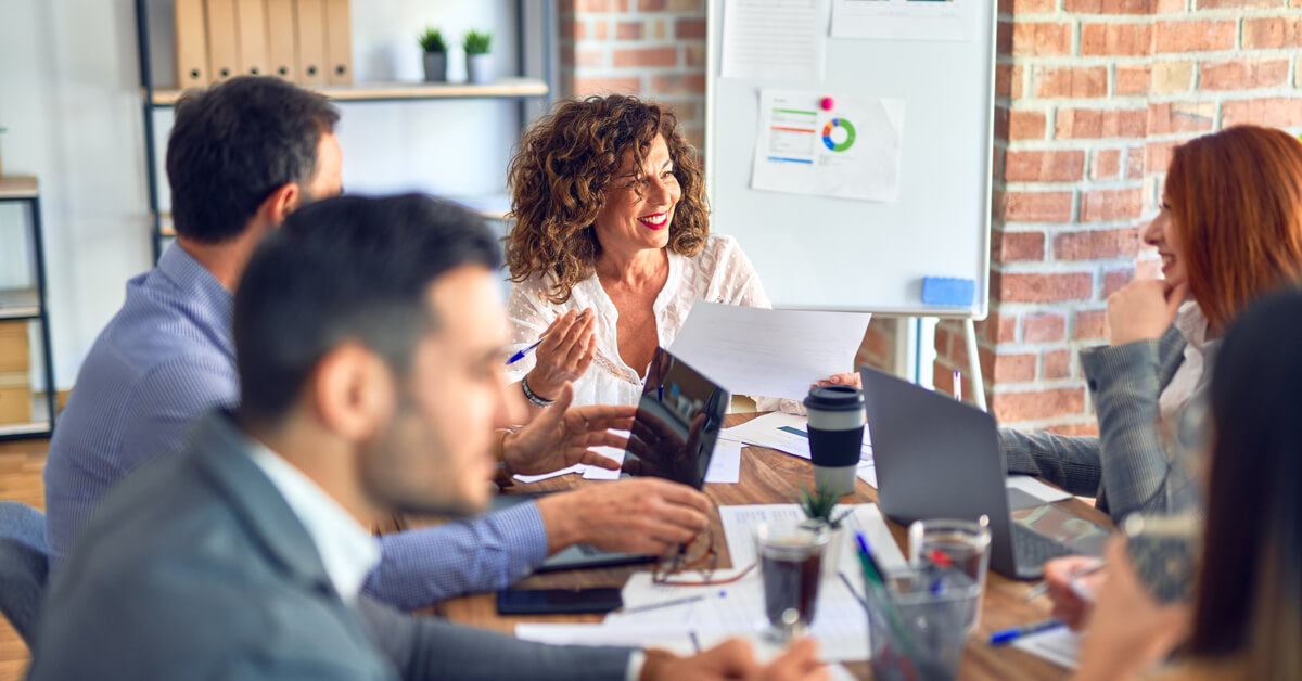 women-smiling-during-meeting